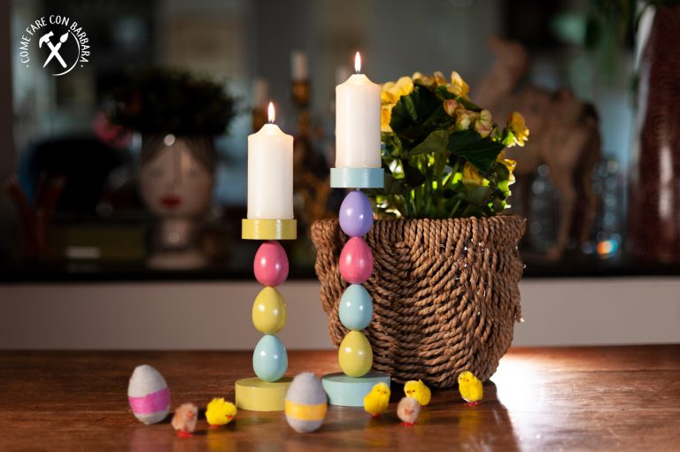 Uova colorate per il portacandele di Pasqua